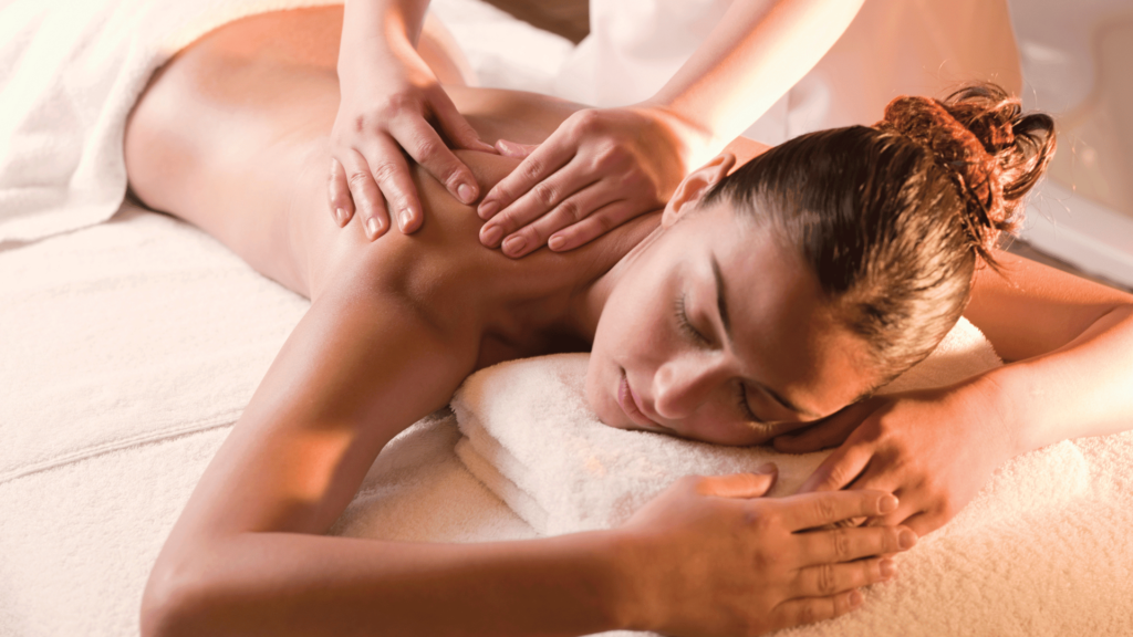 woman getting a Swedish massage on her shoulder