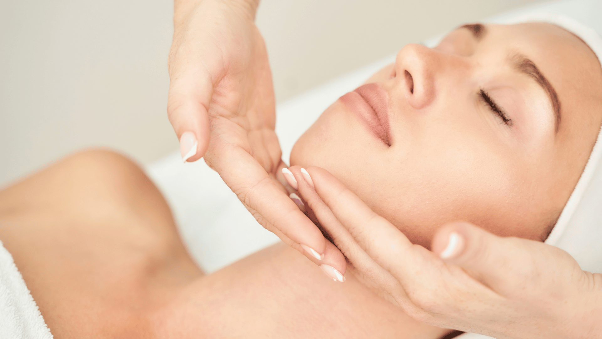 woman getting her chin massaged