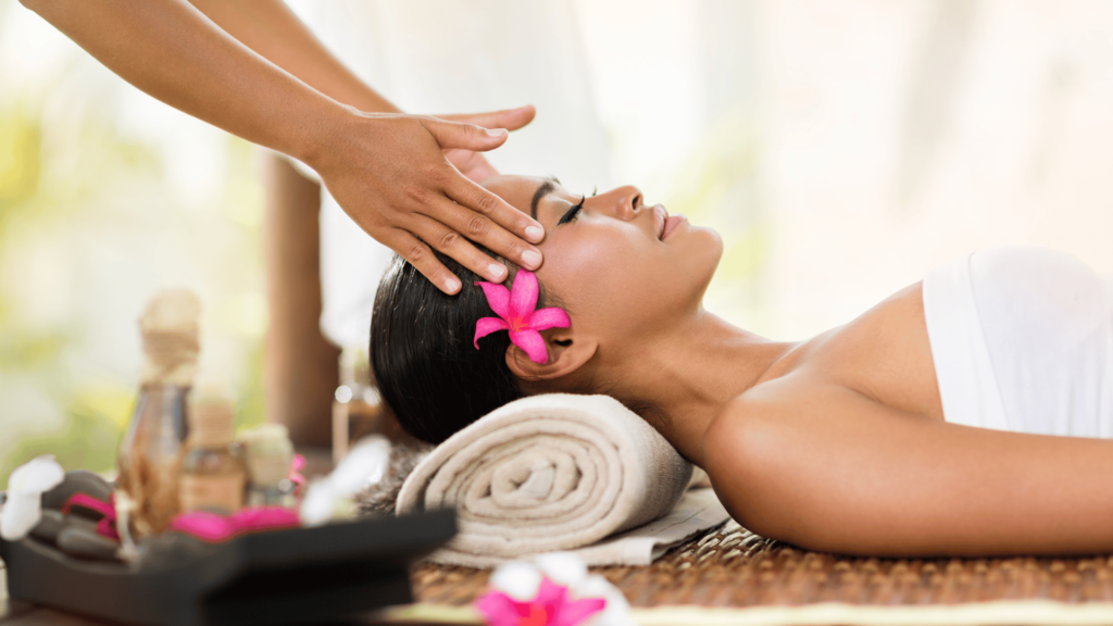 woman having her head massaged