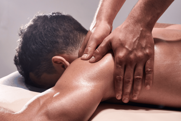 man getting a massage on his shoulder